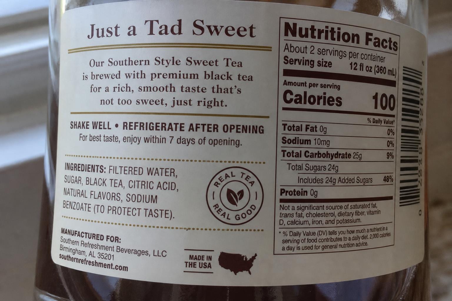 curved beverage bottle label text