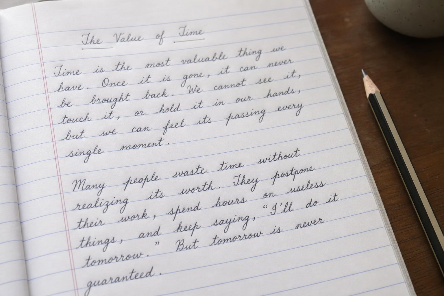 cursive handwriting notebook page